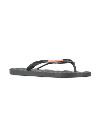 Shop Diesel Logo Flip Flops In Black