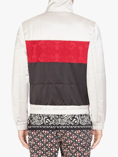 Shop Dolce & Gabbana Striped Quilted Nylon Jacket In White