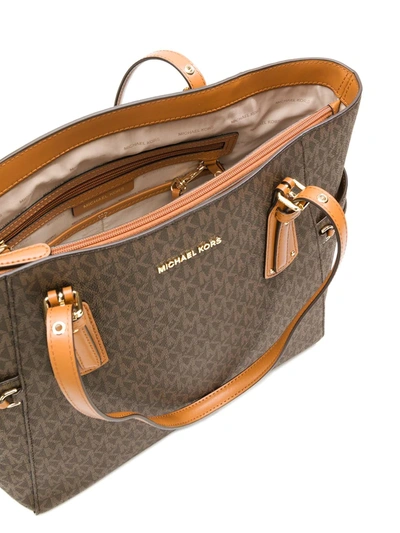 Michael Michael Kors Signature Voyager East West Tote In Brown