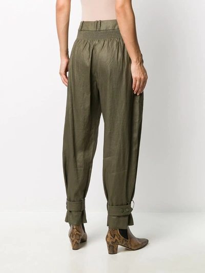 Shop Zimmermann Lucky Tapered Linen Trousers In Green