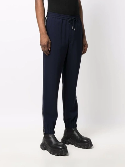 Shop Alexander Mcqueen Tapered-leg Track Pants In Blau