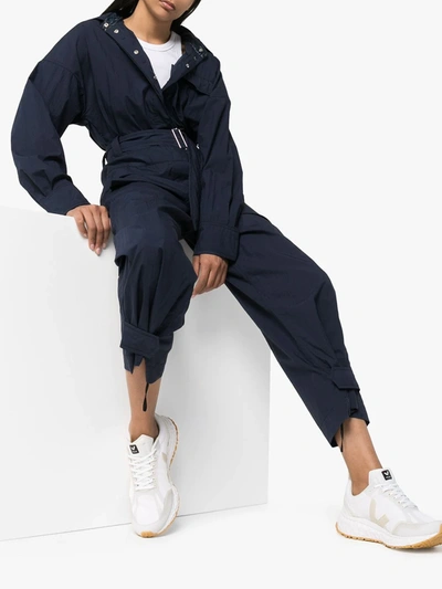 Shop Moncler Belted Long-sleeve Jumpsuit In Blue