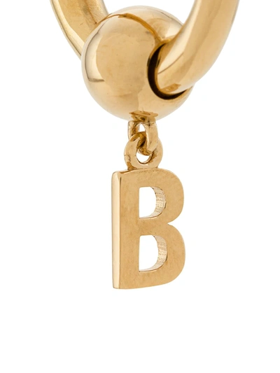 Shop Balenciaga Force B Earring In Gold