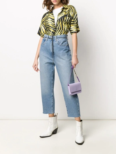 Shop Levi's High-waisted Cropped Jeans In Blue