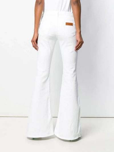 Shop Faith Connexion Low-rise Flared Jeans In White