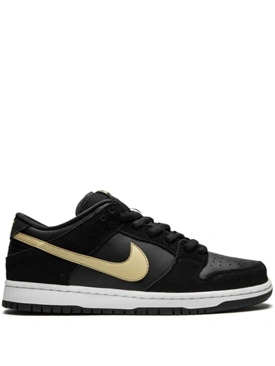 Shop Nike Sb Dunk Low Pro Sneakers In Black