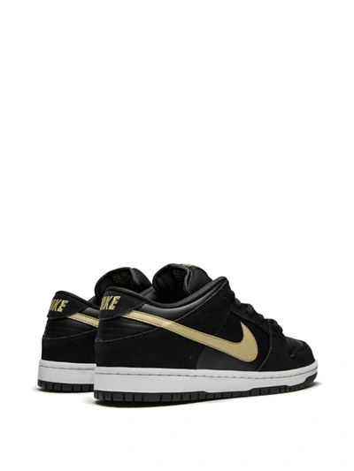 Shop Nike Sb Dunk Low Pro Sneakers In Black