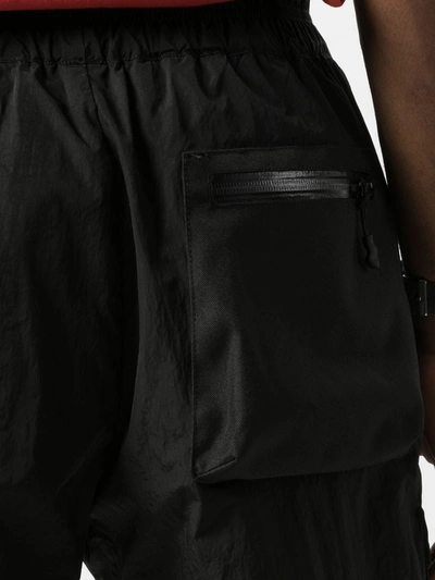 Shop John Elliott Cargo Pocket Track Pants In Black