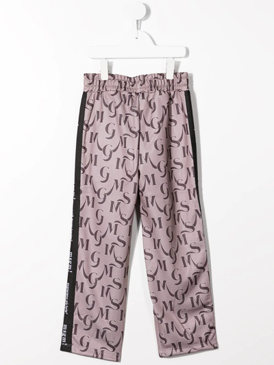 Shop Msgm Monogram Print Trousers In Brown