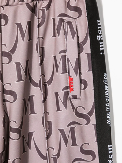 Msgm Monogram Print Trousers In Brown