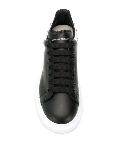 Shop Alexander Mcqueen Crystal Studded Sneakers In Black