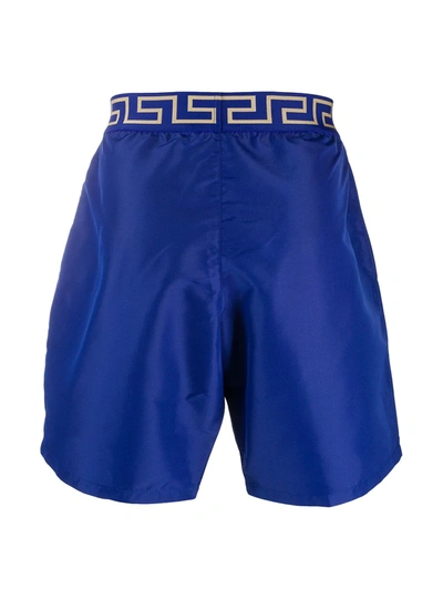 Versace Logo Embroidered Swim Shorts In Blue