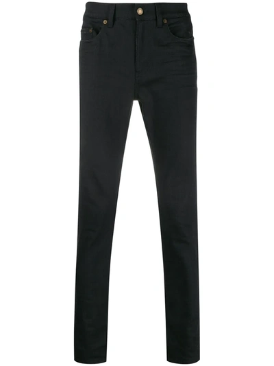 Shop Saint Laurent Mid-rise Skinny Jeans In Black