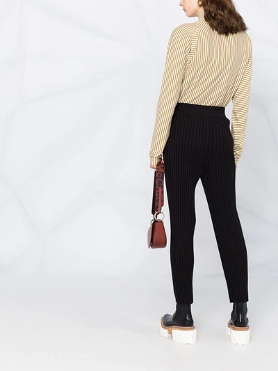 Shop Stella Mccartney Ribbed Knitted Trousers In Black