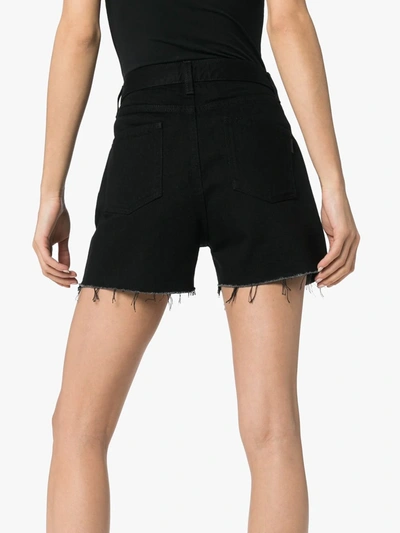 Shop Saint Laurent Fringed Denim Shorts In Black