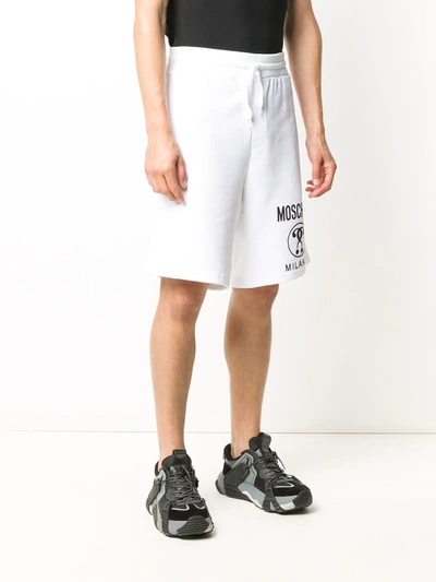 Shop Moschino Logo-print Shorts In White