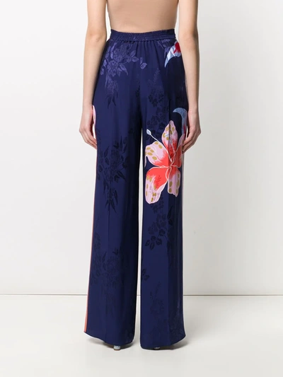 Shop Etro Wide Leg Floral Pattern Trousers In Blue