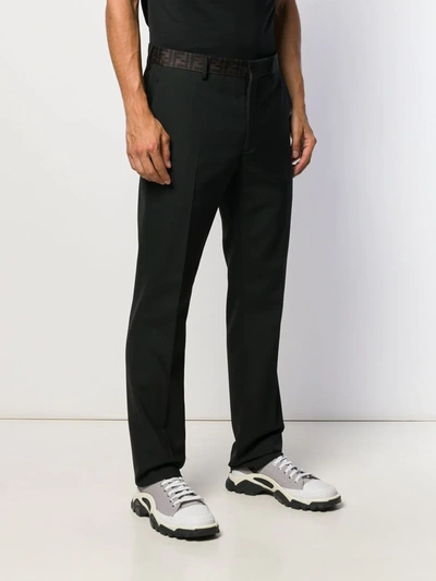 Shop Fendi Logo Waistband Tailored Trousers In Black