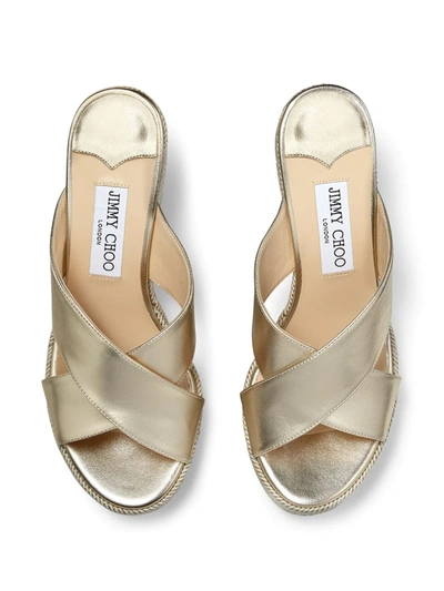 Shop Jimmy Choo Dovina Metallic Strap Wedge Sandals In Gold