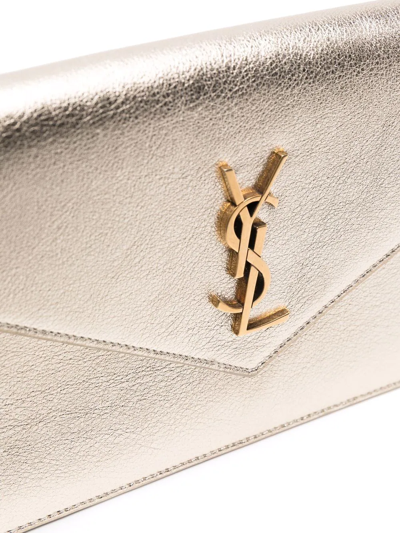 Shop Saint Laurent Cassandre Envelope-wallet Clutch Bag In Gold