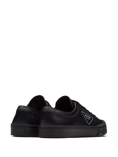 Shop Prada Wheel Sneakers In Black