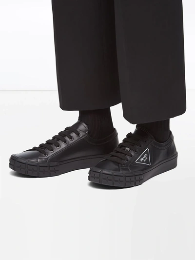 Shop Prada Wheel Sneakers In Black
