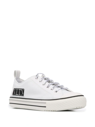 Shop Valentino Vltn Low-top Sneakers In White