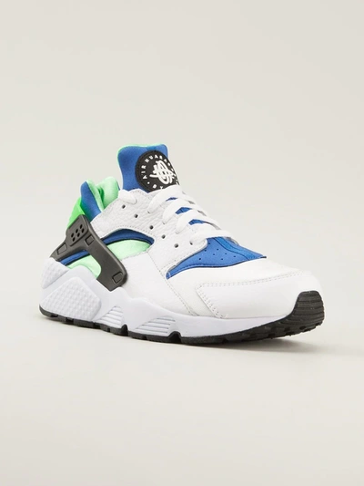 Shop Nike Air Huarache Sneakers In White