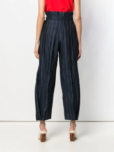 Shop Emporio Armani Belted Striped Trousers In Blue