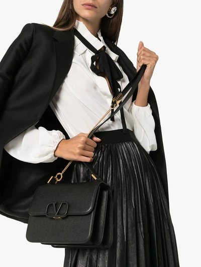 Shop Valentino Medium Vsling Shoulder Bag In Black
