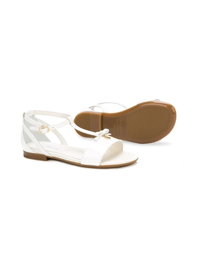 Shop Dolce & Gabbana Strappy Flat Sandals In White