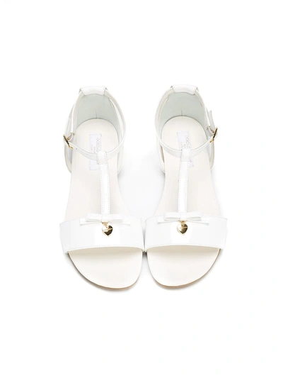 Shop Dolce & Gabbana Strappy Flat Sandals In White