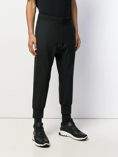 Shop Neil Barrett Panelled Jogging Trousers In Black