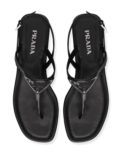Shop Prada Strappy Thong Sandals In Black