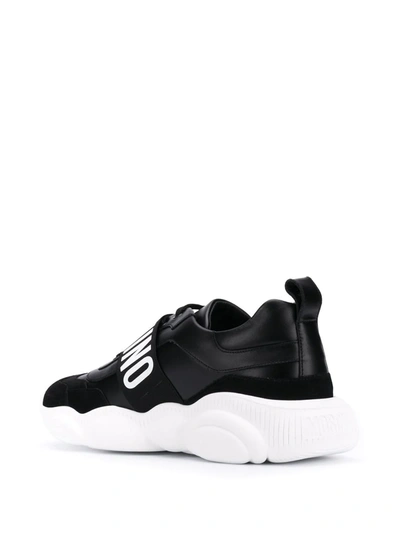 Shop Moschino Logo Strap Sneakers In Black