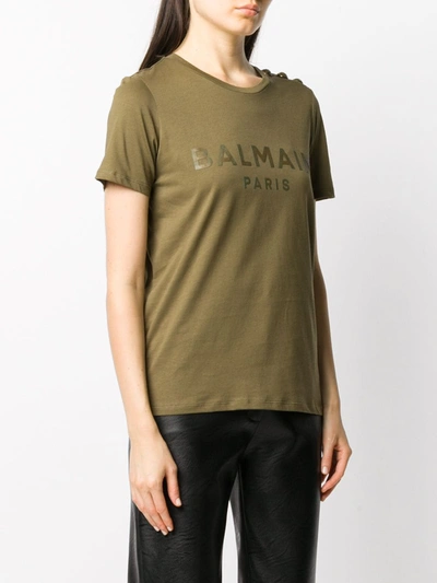 Shop Balmain Button-embellished Logo Print T-shirt In Green