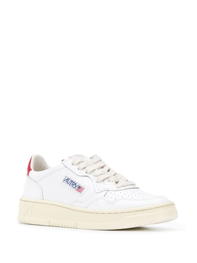 Shop Autry Contrasting Heel Sneakers In White