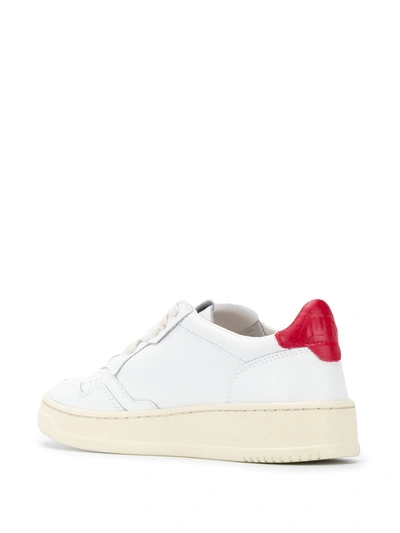 Shop Autry Contrasting Heel Sneakers In White