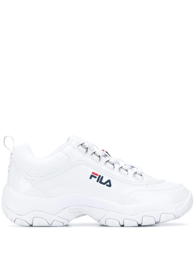 Shop Fila Strada Chunky Sole Sneakers In White