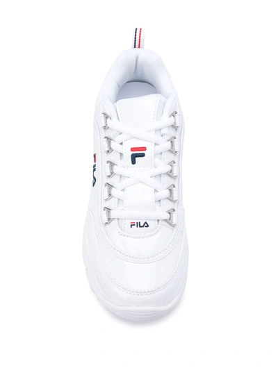 Shop Fila Strada Chunky Sole Sneakers In White