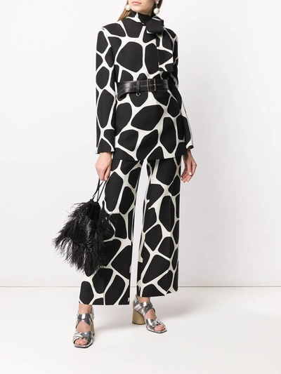 Shop Valentino Giraffe Print Palazzo Trousers In Black