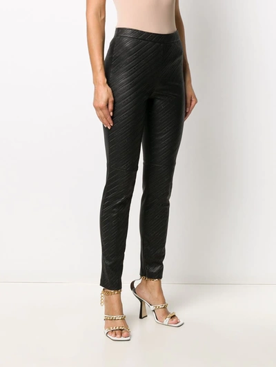 Shop Givenchy Textured Logo Stripe Leggings In Black