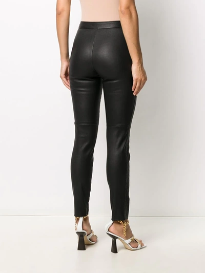 Shop Givenchy Textured Logo Stripe Leggings In Black