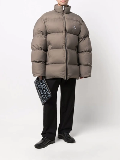 Shop Balenciaga Sporty B Cosy Puffer Jacket In Braun