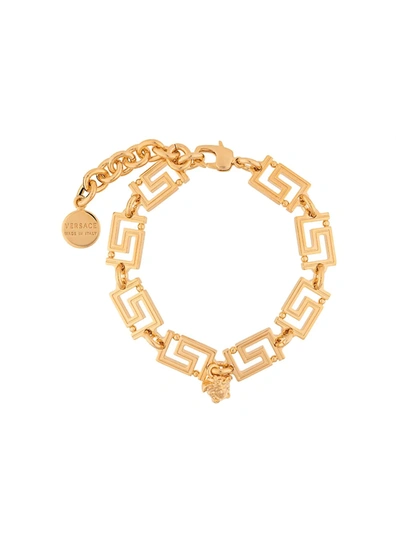 Shop Versace Greca Chain Bracelet In Gold