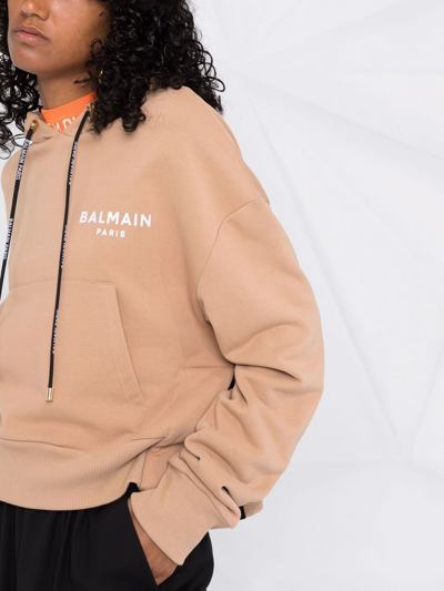 Shop Balmain Flocked Logo Hoodie In Nude