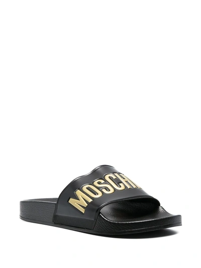 Shop Moschino Logo-letter Slides In Black