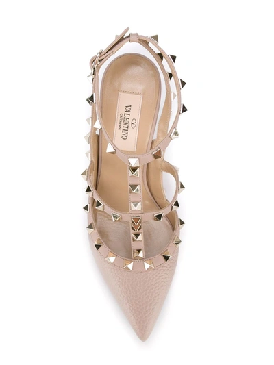 Shop Valentino Rockstud Pumps In Neutrals