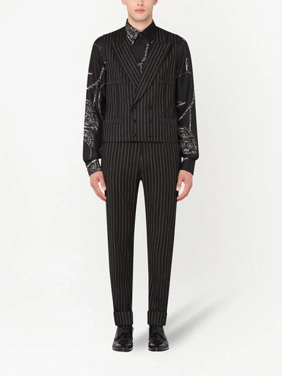 Shop Dolce & Gabbana Pinstripe Wool Trousers In Black