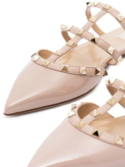 Shop Valentino Rockstud Patent Leather Mules In Neutrals